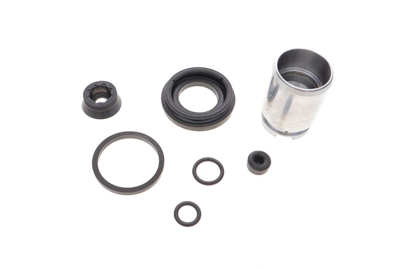 Ремкомплект супорта (заднього) Renault Megane I/Scenic I 99-03 (d=34mm) (+ поршень) QUICK BRAKE
